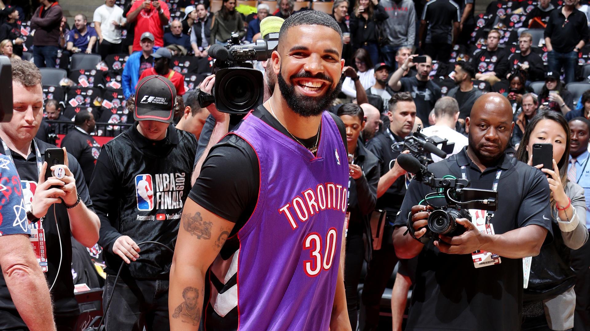 Drake Trolls Warriors By Wearing Dell Curry Raptors Jersey To Game 1 Of NBA Finals